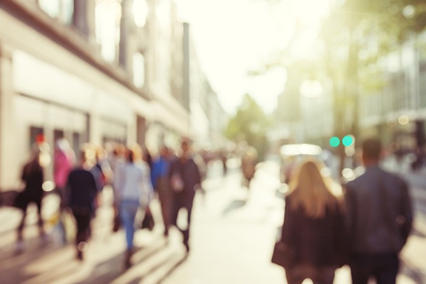 Blurred scene of people on city street